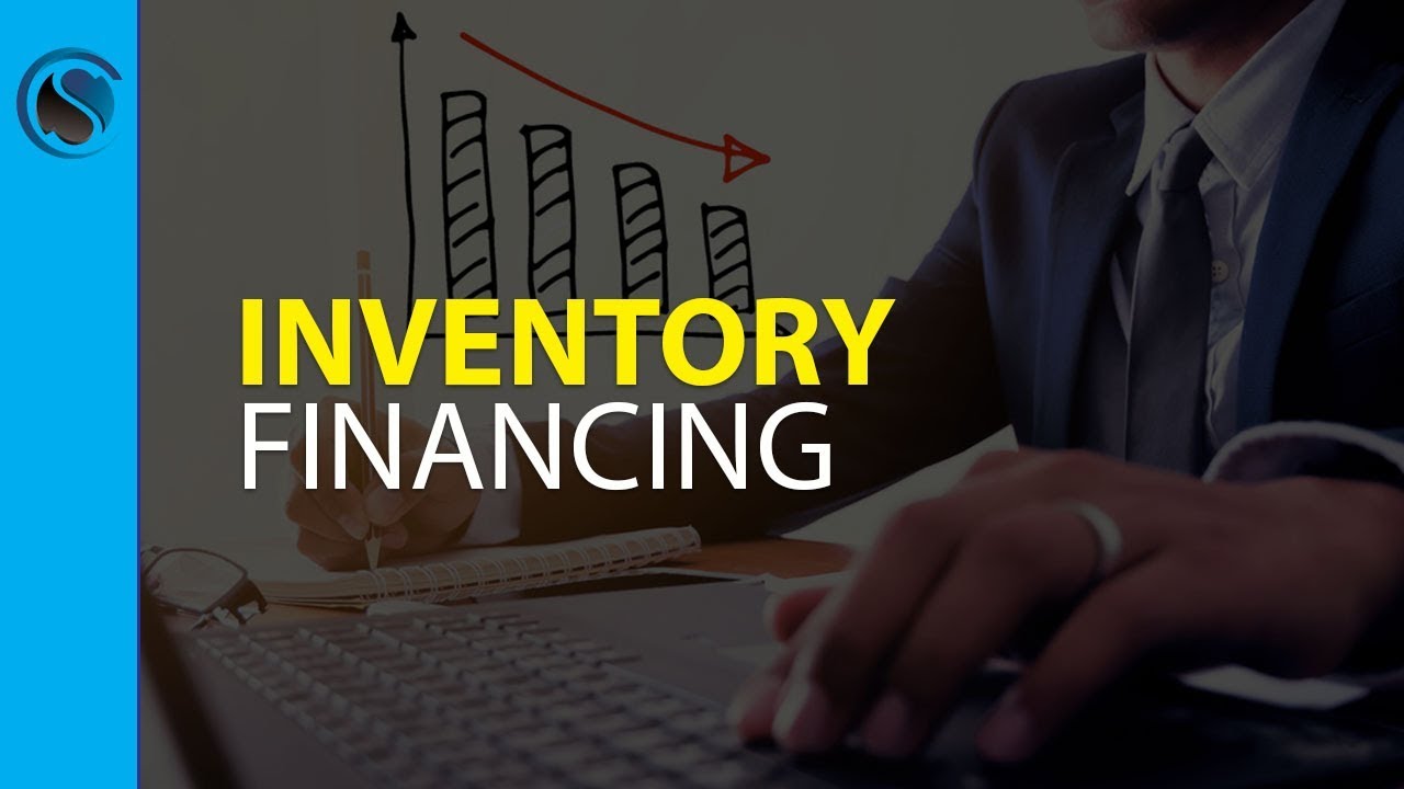 Man on computer calculating options used for inventory financing